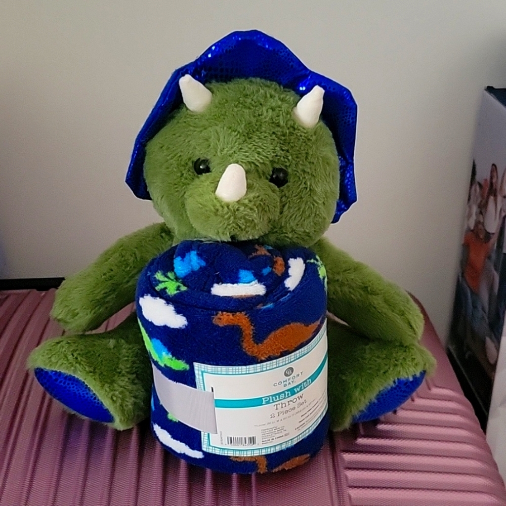 Plush with throw